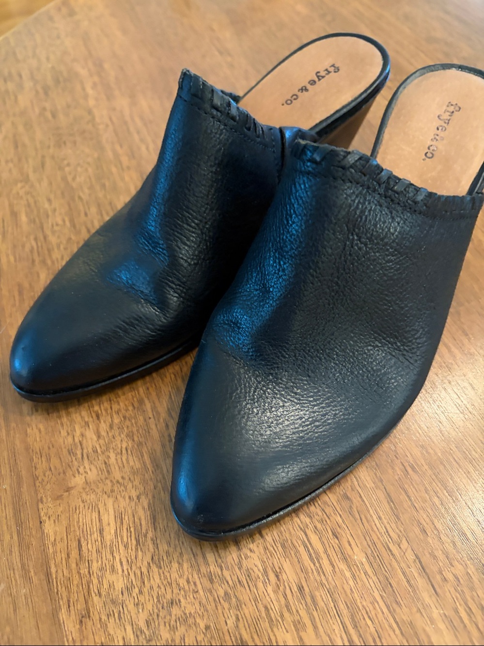 FRYE AND CO. Black Leather Slide Mules with Tan Footbed